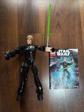LEGO Star Wars Black Action Figure with Green Lightsaber